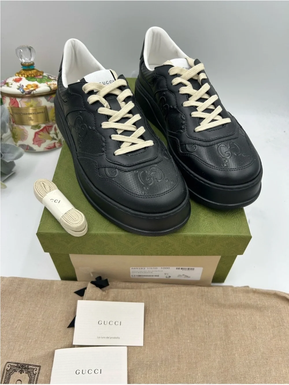 Men’s Gucci, Gigi embossed leather sneakers size 9.5 it’s 10.5 US made in Italy